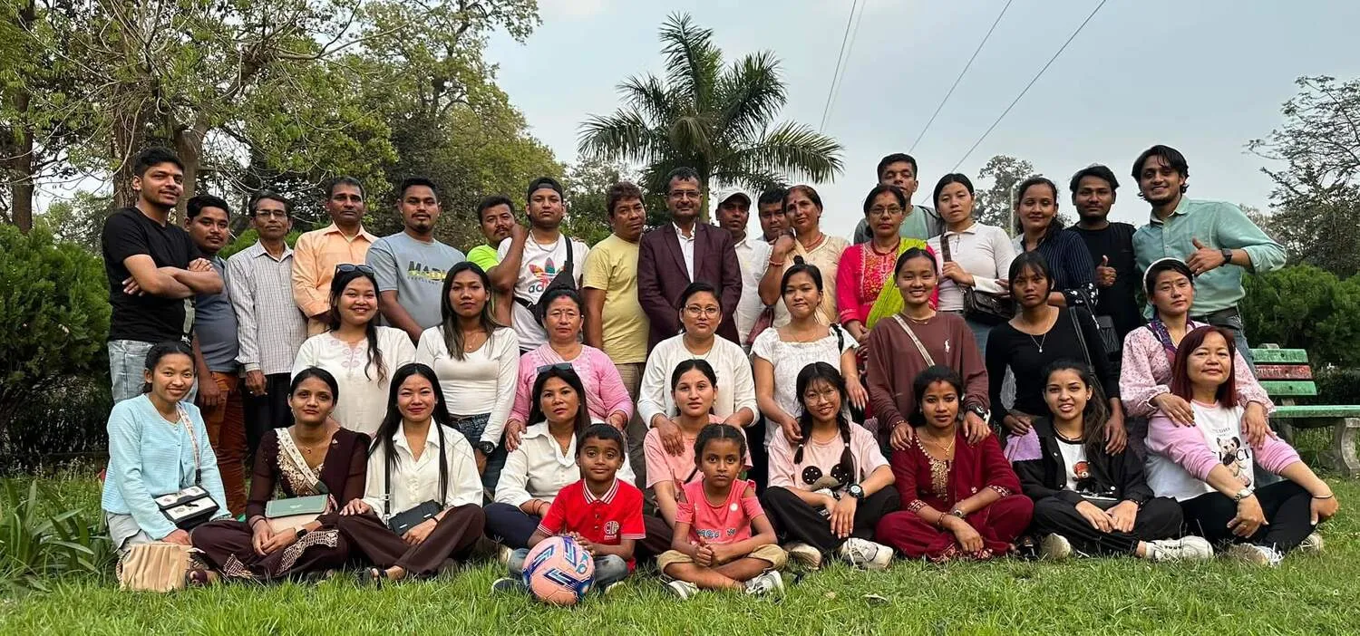 The Trishakti Apparel team and families together outdoors