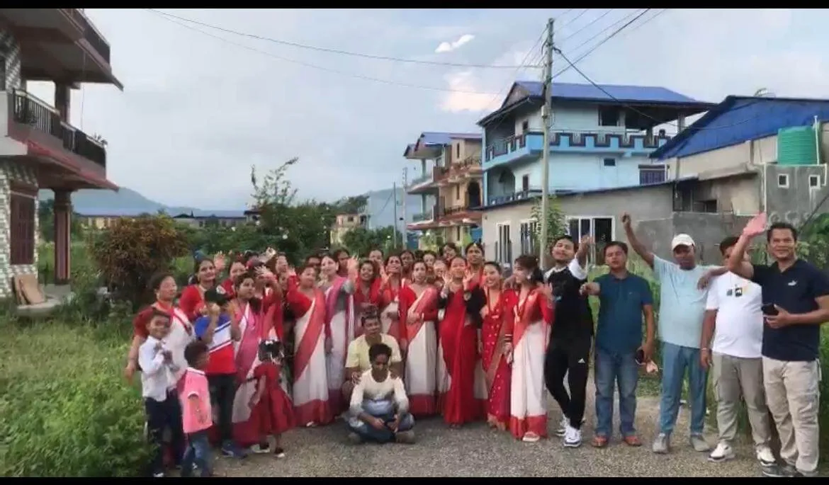 Trishakti Apparel staff celebrating Teej on the road outside the factory